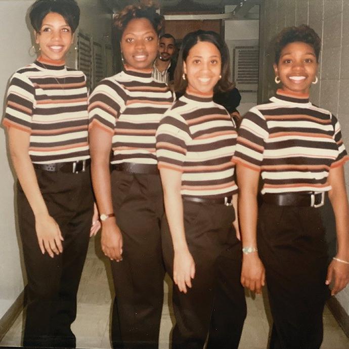 Four women in striped shirts; 1996